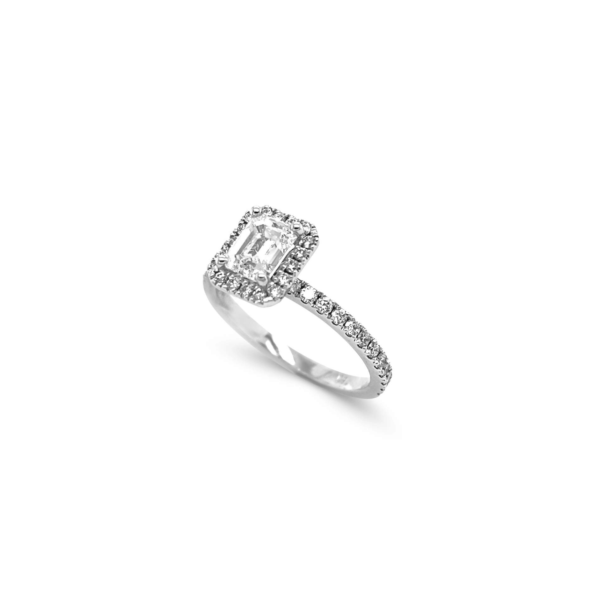 Ring with emerald cut diamond