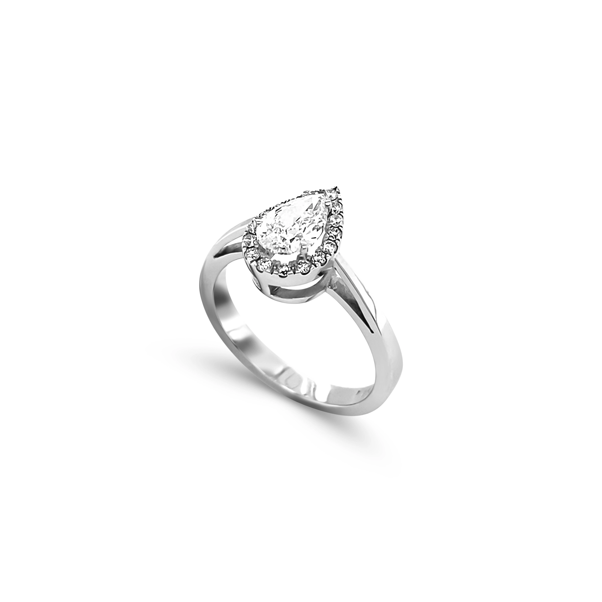 Engagement ring with pear cut diamond 
